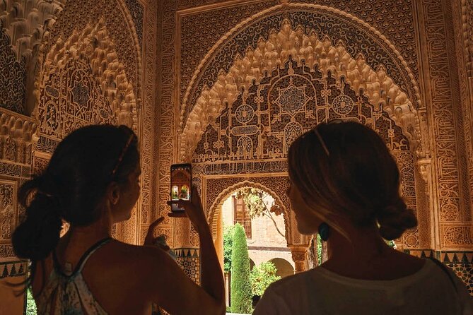 Alhambra Ticket with Audio Guide in Granada - Collecting the ticket on Carrera del Darro