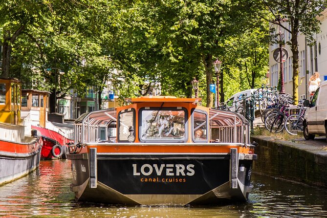Amsterdam 1h Canal Cruise by Semi-Open Boat with Audio Guide - The Anne Frank House and museums along the route