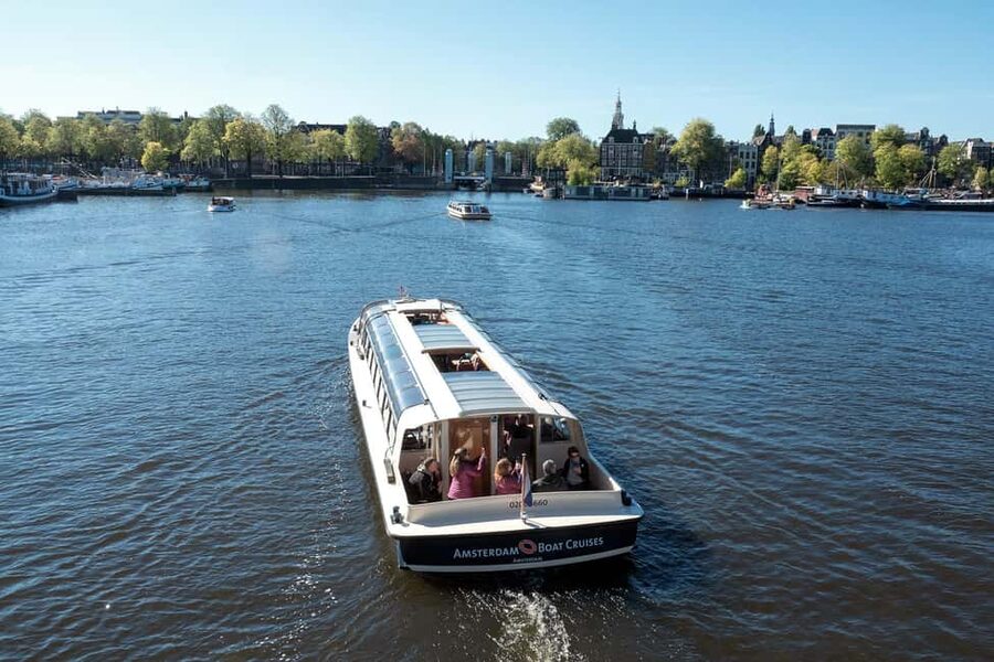 Amsterdam: Canal Cruise with Live Commentary & Audio Guide - Starting across the IJ River from Amsterdam Centraal