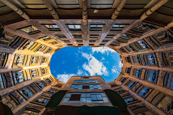 Barcelona: Reserved Entrance to Casa Mila (La Pedrera) with Audio - Reaching the rooftop and meeting Gaudi’s stone figures