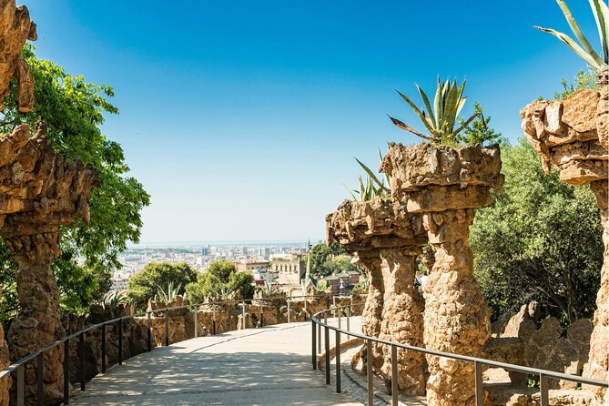 Barcelona: Reserved Group Entrance to Park Güell with Audio Guide - Walking the Stone Paths and Garden Areas