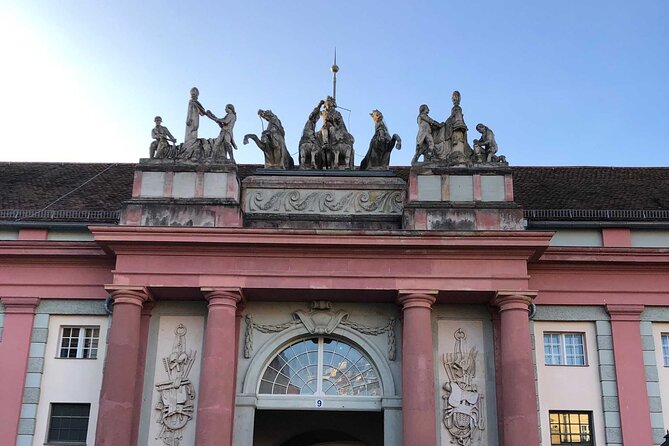 Beautiful Baroque Potsdam: A Self-Guided Audio Tour - Alter Markt and the faces on the obelisk