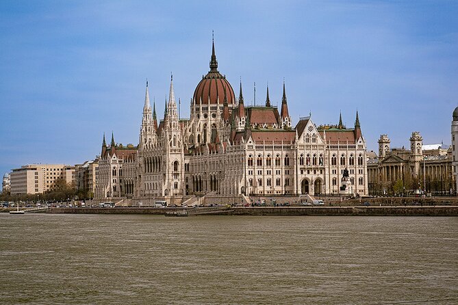 Budapest Danube 1 Hour Sunset or Night Cruise with Audio Guide - Buda Castle and the Castle District rise above the river