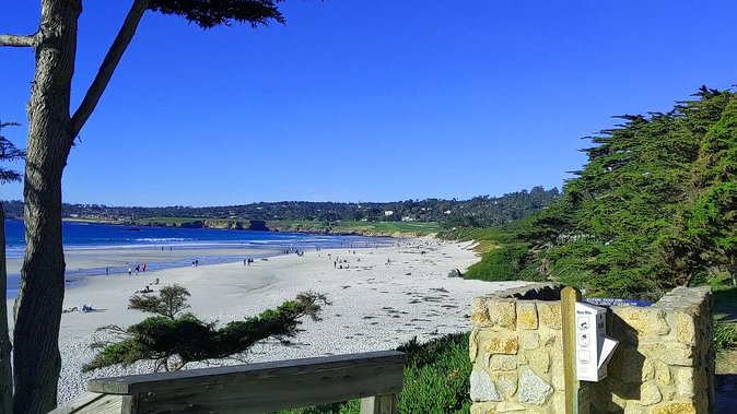 Carmel by the Sea: A Self-Guided Driving Audio Tour - Carmel’s wide beach and changing blue water