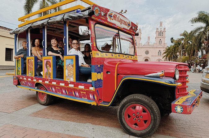 Chiva Private Cultural Tour with Audio Guide in Buga - Cabal Park, churches, and the Municipal Theatre
