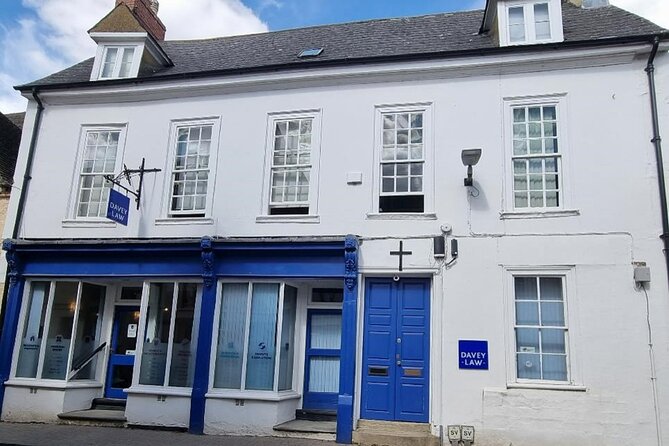 Cirencester’s Tall Tales and Hidden History: A Self-Guided Audio Tour - The Norman gatehouse and former abbey