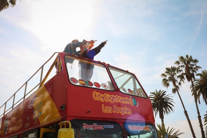 City Sightseeing Hop-On Hop-Off Bus Tour with Audio Guide - Downtown Purple Route: museums, markets, and city history