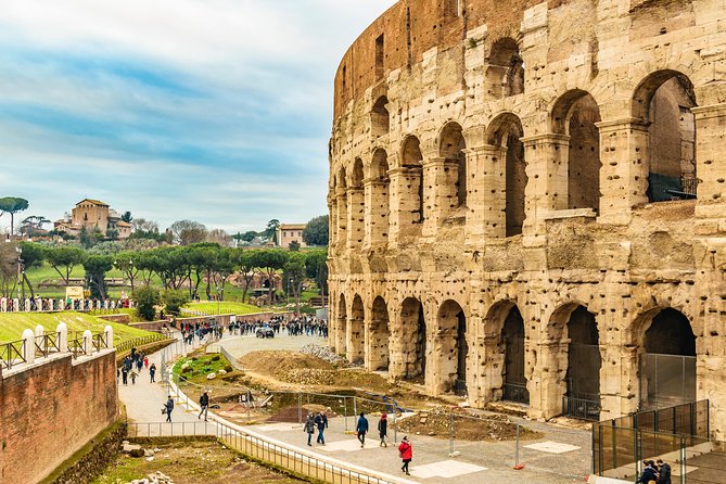 Colosseum and Roman Forum Group Tour or Audio Guided tours - Entering the Colosseum for the one-hour visit