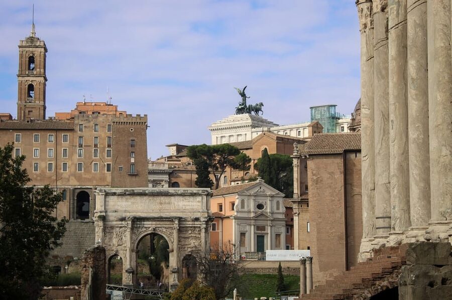 Colosseum Entry with digital audioguide and arena option - Walking the Roman Forum after the Colosseum
