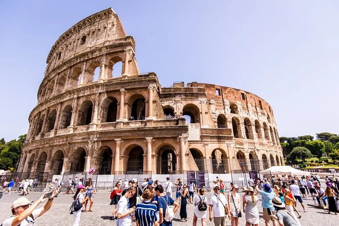 Colosseum, Palatine Hills & Roman Forum Ticket with Audio Guide - Walking through the Roman Forum and Imperial Forums