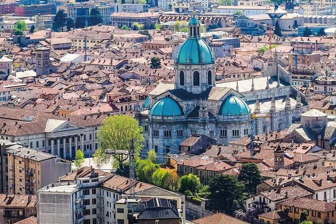 Como Walking Tour with Audio and Written Guide by a Local - Piazza San Fedele and the Dragon Portal