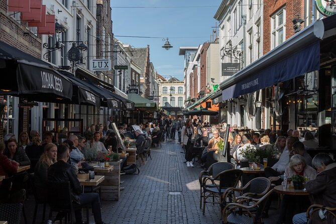 Den Bosch: City Walk Audio Guide in 7 Languages on your Phone - The Dragon Fountain and a curious civic landmark