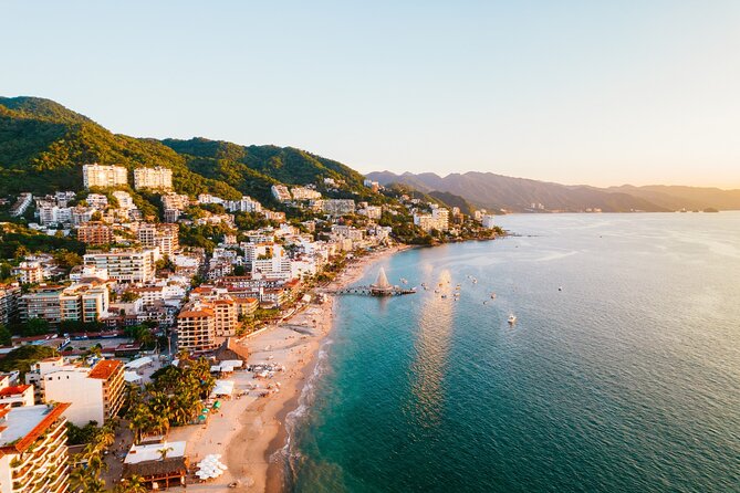 Discover Puerto Vallarta: Audio Walking Self-Guided Tour - Crossing the Cuale River on the Iguana Bridge