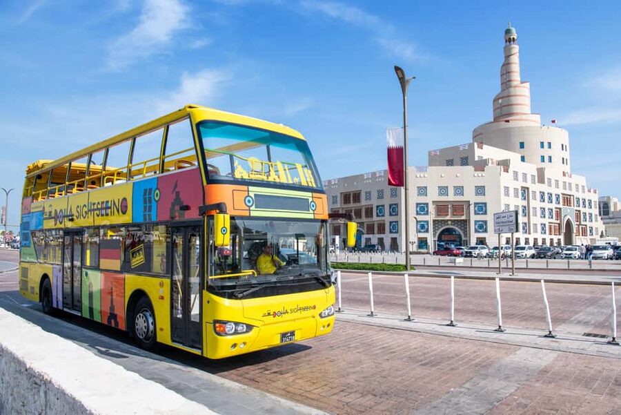 Doha: 24-Hour Hop-On Hop-Off Bus Ticket with Audio Guide - National Museum of Qatar and the Desert Rose design