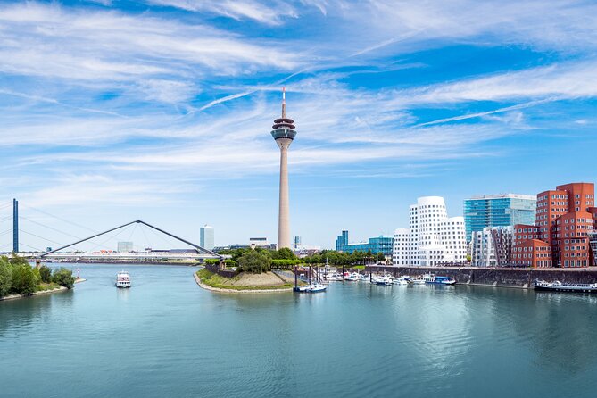 Dusseldorf: City Walk Audio Guide in 7 Languages on your Phone - Market square and smaller local stories