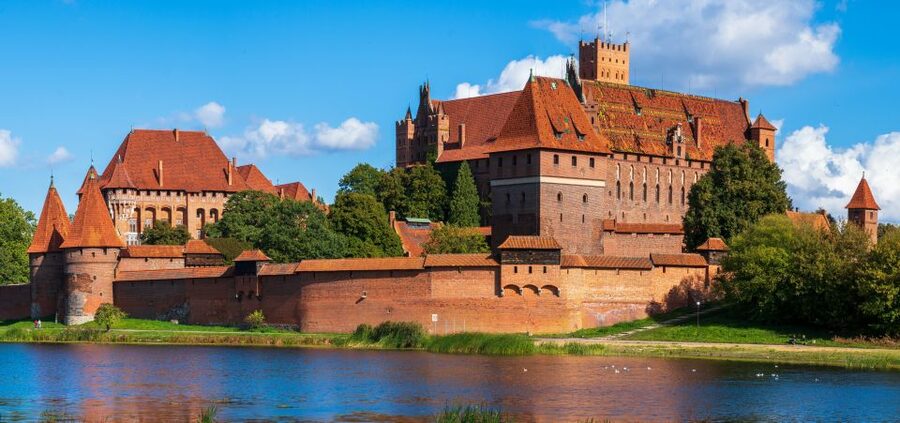 From Gdansk: Half-Day Malbork Castle Tour with Audioguide - Arriving at the world’s largest castle