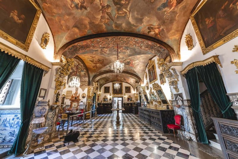 Granada: Basilica of San Juan de Dios Ticket & Audio Guide - Entering the gold-filled Baroque interior