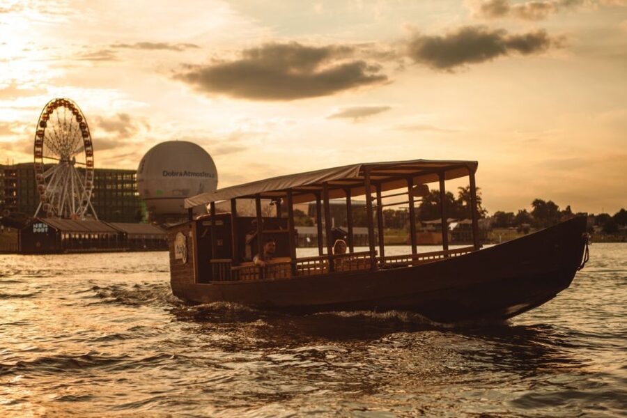 Krakow: Vistula Night Cruise by Gondola w/ Audio Commentary - Boarding beside Bernatek footbridge in Kazimierz