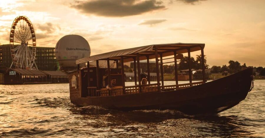 Krakow: Vistula Night Cruise by Gondola w/ Audio Commentary - A wooden boat with old-fashioned character