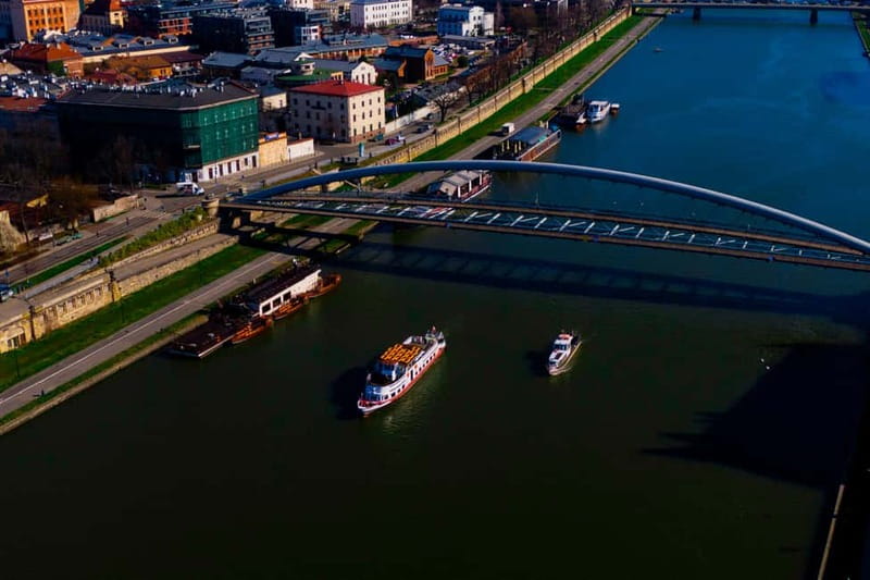 Krakow: Vistula River Sightseeing Cruise with Audio Guide - Grunwald Bridge and the riverfront skyline