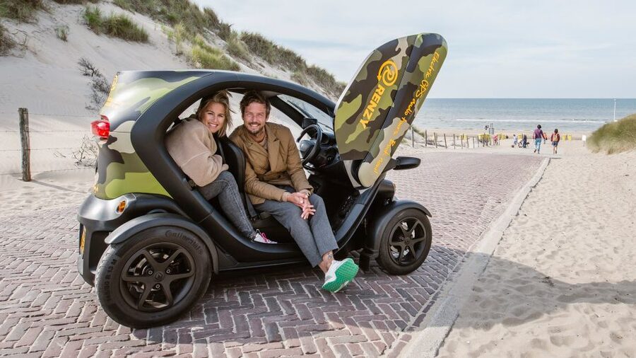 Lisse: Self-Drive Electric Car Dune and Beach Audio Tour - Stopping at the beach for photos