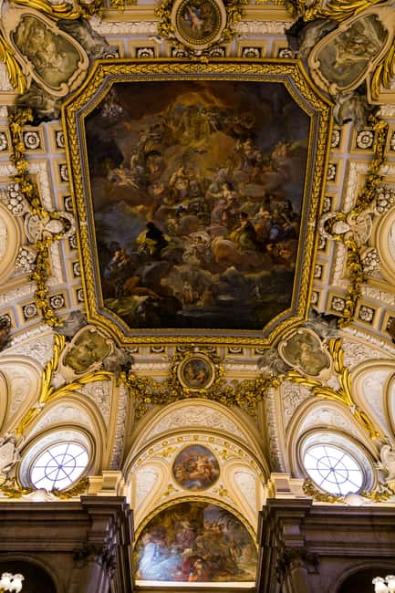Madrid: Royal Palace Entry with Audio Guide - Collecting your ticket at Plaza de España 9