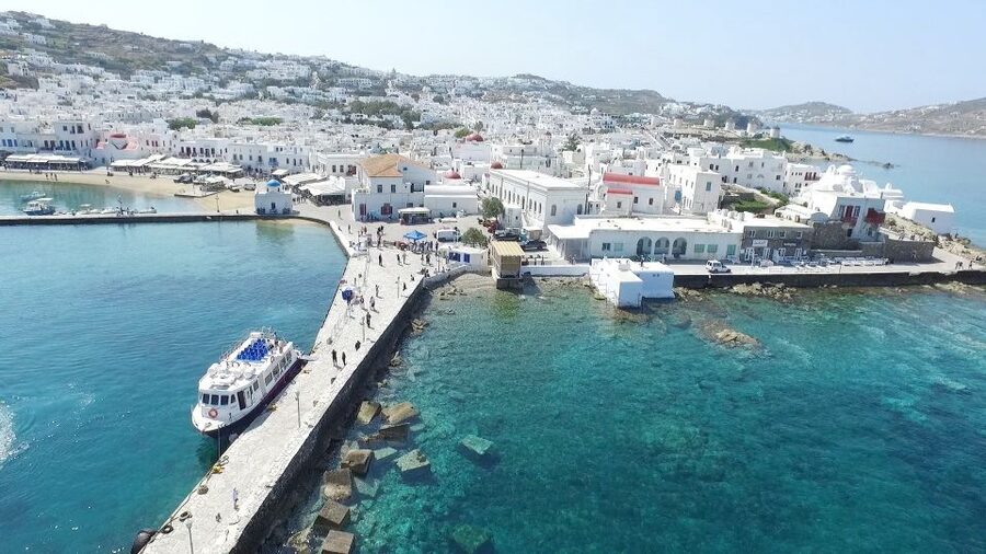 Mykonos: Delos Boat Transfer with Cell Phone Audioguide - Entering the archaeological site