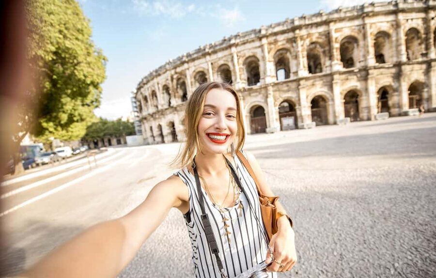 Nimes: Ancient Roman Arena Ticket & Old Town Audio Tour - From gladiator contests to Dua Lipa and bullfighting