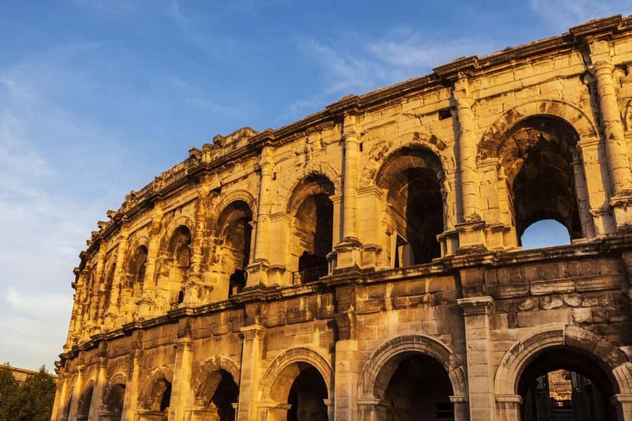 Nimes: Ancient Roman Arena Ticket & Old Town Audio Tour - Audio languages and what you need to bring