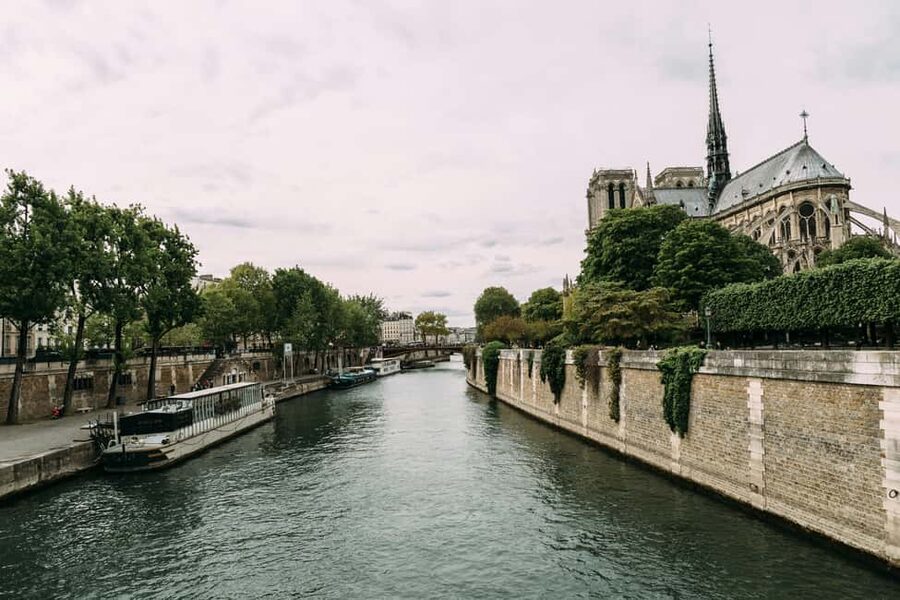 Notre-Dame Tour with Host or AudioGuide + Optional Cruise - Entering a cathedral rebuilt after fire