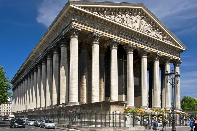 Paris Luxury Minivan City Tour with Audio Guide - Place Vendôme offers a polished view of Paris luxury