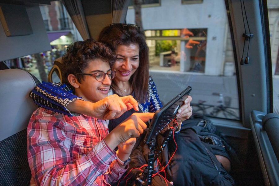 Paris: Openair Double Decker Bus Audio-Guided City Tour - The audio guide and the role of the hostess