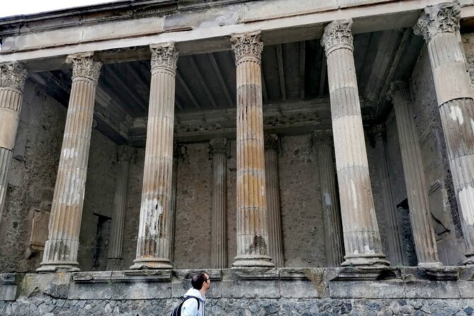 Pompeii from Naples: Smart Audio Guide with Travel Instructions - Apollo, the Lupanar, and Pompeii’s public entertainment