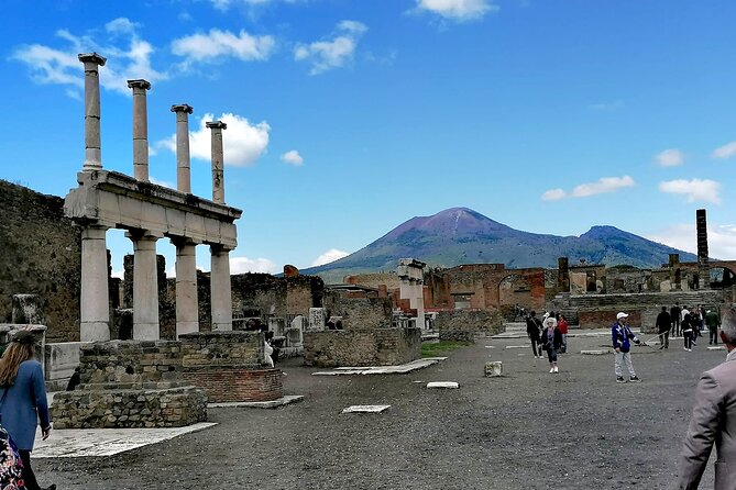 Pompeii from Naples: Smart Audio Guide with Travel Instructions - Modern sculpture beside ancient ruins