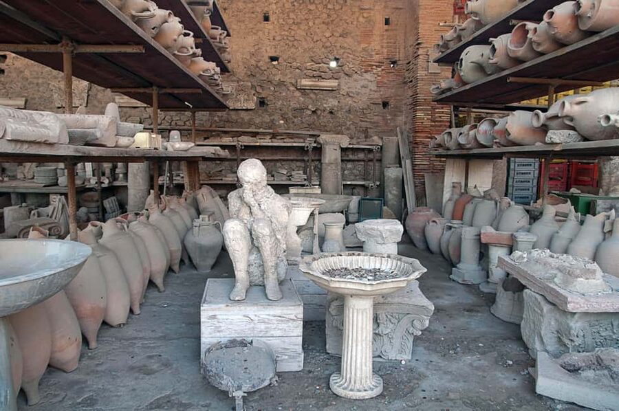 Pompeii: Skip-the-Line Ticket with Audio Guide and Map - Entering Pompeii beside Pasticceria De Vivo