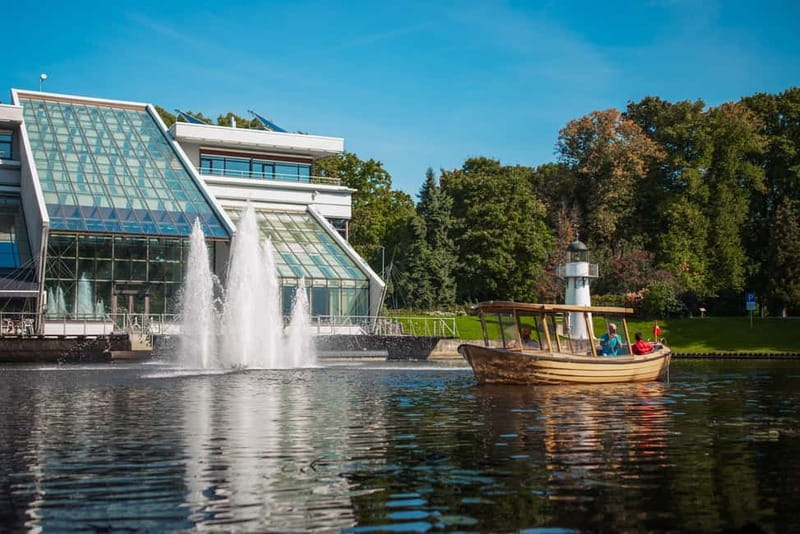 Riga: Canal Boat Sightseeing Tour With Audio guide - Kronvalda Park, the National Theatre, and Bastejkalns