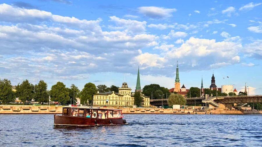 Riga: Canal Boat Tour with Welcome Drink & Audio Guide - Through Riga Canal and its parks