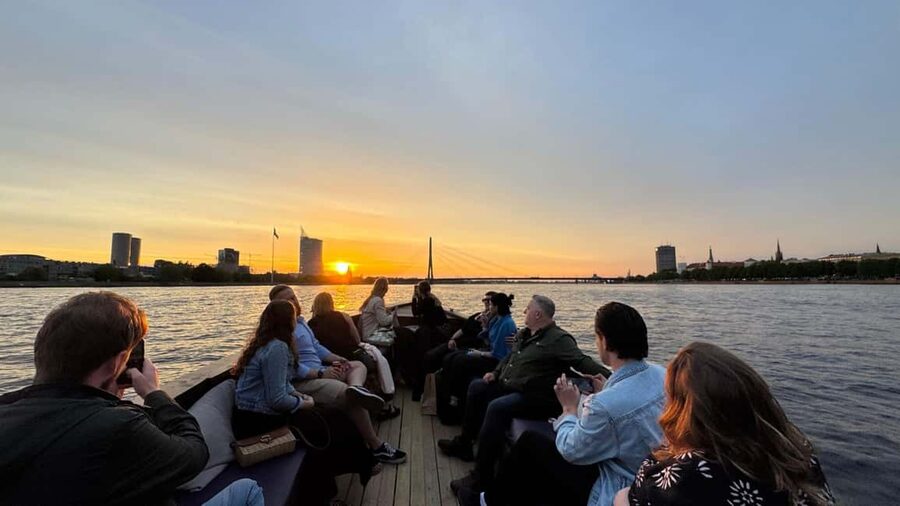Riga: Canal Boat Tour with Welcome Drink & Audio Guide - Riga Central Market from the water