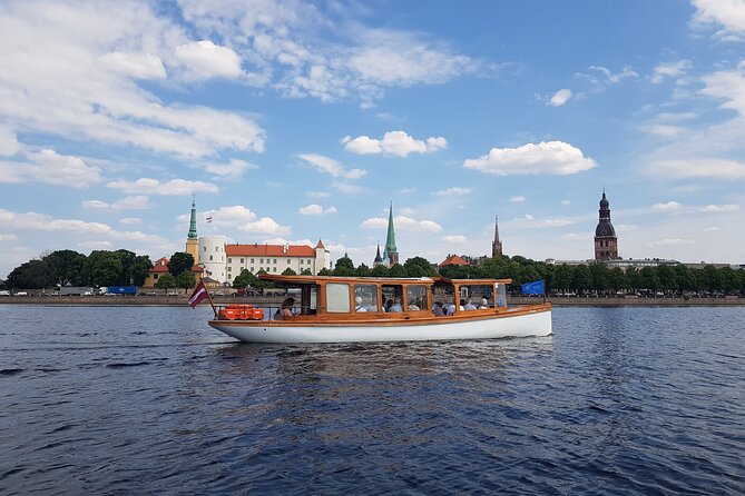 Riga City Canal & Daugava River Premium Boat Tour with Audioguide - A quiet start beside Bastejkalna Park