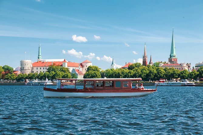Riga City Canal & Daugava River Premium Boat Tour with Audioguide - Riga Castle, Kipsala, and the river’s quieter side