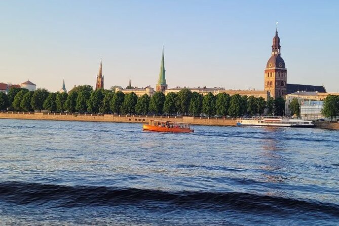 Riga: Evening or Sunset Boat Tour with Drink and Audio Guide - Photography, weather, and choosing your departure
