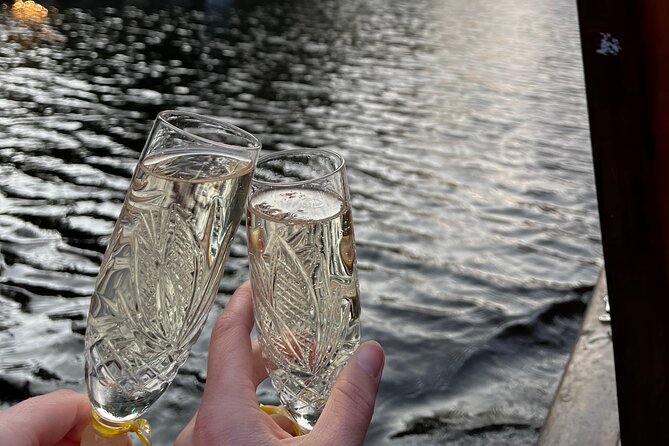 Riga: Evening or Sunset Boat Tour with Drink and Audio Guide - How much value do you get for $13.88?