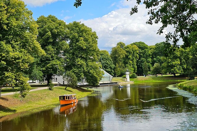 Riga: Evening or Sunset Boat Tour with Drink and Audio Guide - Who should book this boat ride?
