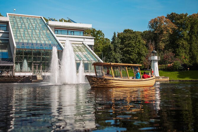 Riga Sightseeing Tour by Canal Boat with Audioguide - Riga’s canal parks make the best opening