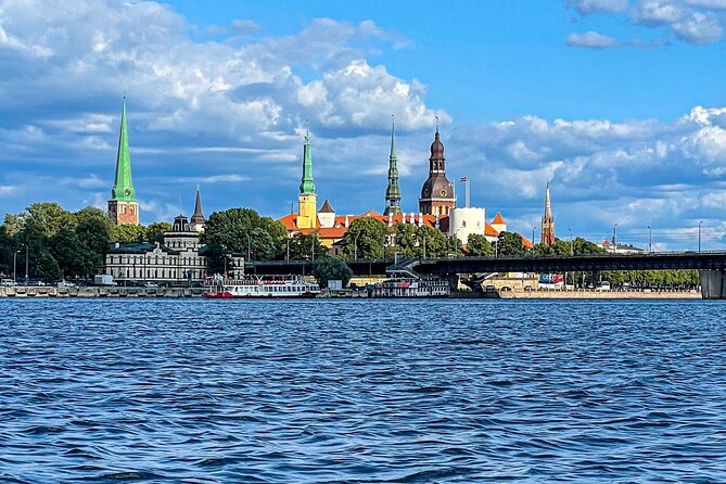 Riga Sightseeing Tour by Canal Boat with Audioguide - The tunnel, railway works, and Central Market