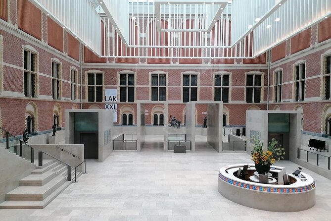 Rijksmuseum Amsterdam Ticket with Audio & Canal Cruise - Beyond paintings: Delftware, clothing, and maritime art