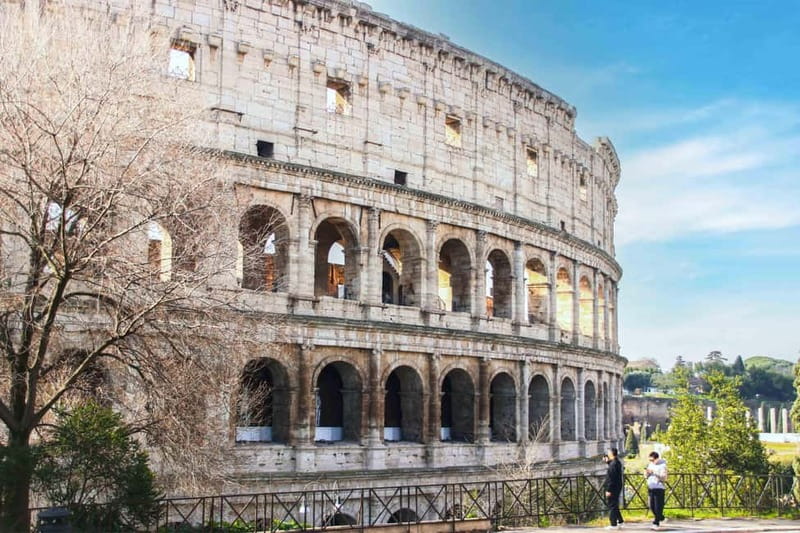Rome: Colosseum, Forum, Palatine Hill Entry, and Audio Guide - Walking through the Roman Forum