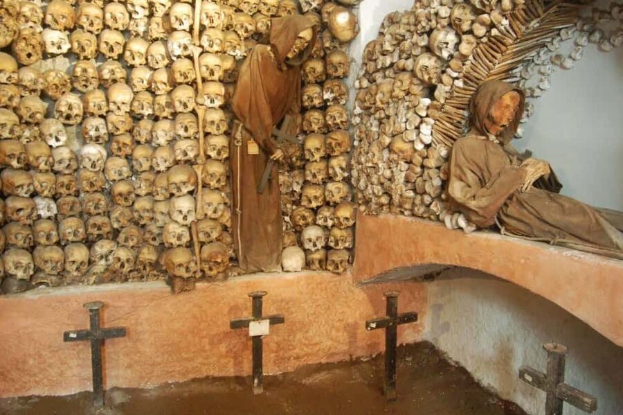 Rome: Guided Catacombs Tour & Capuchin Crypt (Audio Guide) - Walking through the Domitilla or Callisto Catacombs
