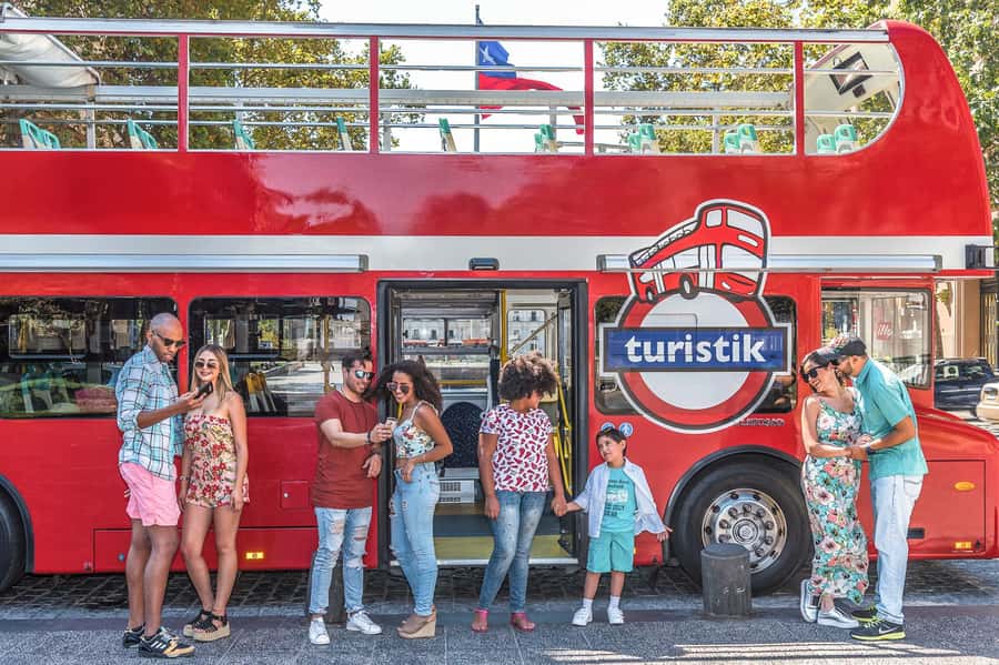 Santiago: Hop-on Hop-off Bus Day Ticket with Audio Guide - Starting at Parque Arauco and moving through modern Santiago