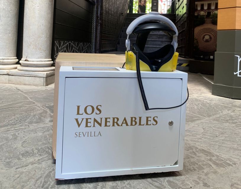 Seville: Hospital de los Venerables Ticket with Audio Guide - The courtyard, arches, and old wooden doors